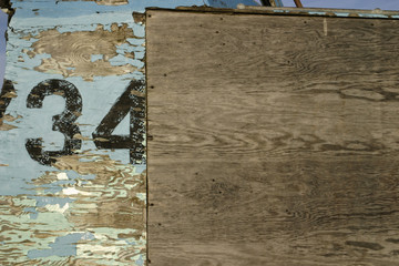 Old weathered wood background with number 34