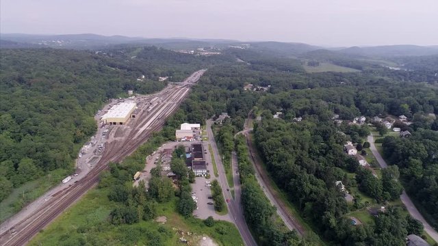 Flying Towards Brewster Train Yard and Town in  Upstate New York