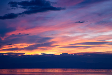 Spectacular orange and purple sunset over mountain