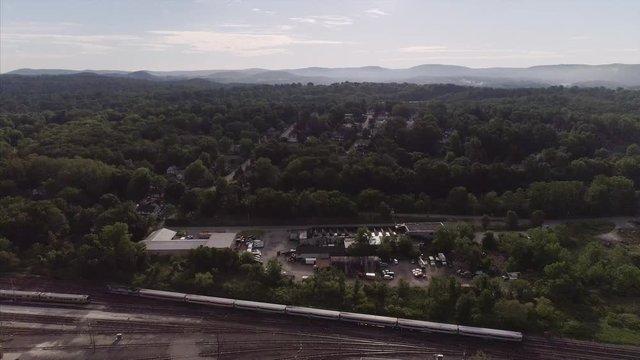 Birds Eye of Brewster New York, Moving Train is Seen From a Distance 