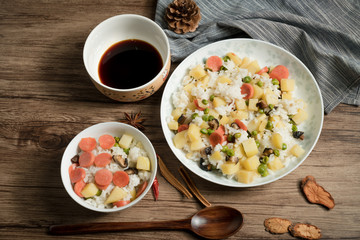 Wooden background and cooked rice