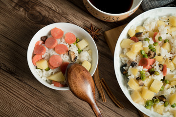 Wooden background and cooked rice