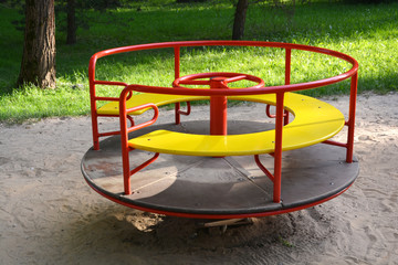 Fototapeta na wymiar Colorful playground equipment in park