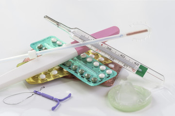 Gynecology symbol concept several type of birth control method on a white background