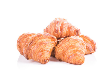 Fresh croissants isolated on white background