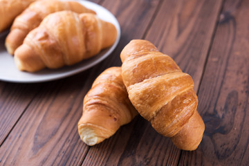 Freshly baked butter croissant. Closeup