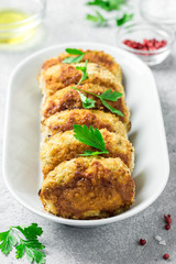 Healthy vegetable cutlets with herbs. Selective focus, space for text.