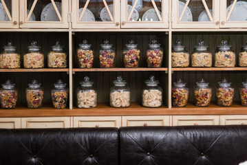 Banks with different kinds of pasta in the closet