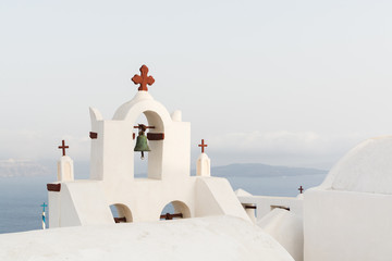 Details of a traditional Orthodox Greek church on a sunny summer day, with the typical blue and white colours. Santorini, Cyclades Islands, Greece, Europe