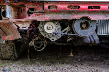 Fototapeta na wymiar Detail of red tractor in countryside