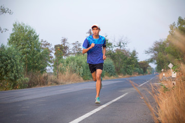 Sport runner man running on road