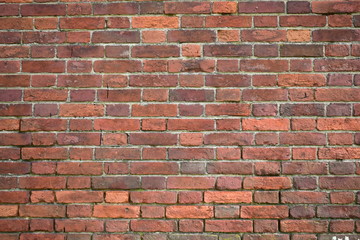 Fototapeta premium Background of a brick wall texture, 50 years old