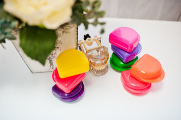 Different colored dentist tools at dental office.