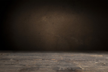 Old wood table top with smoke in the dark background.