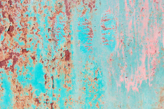 Texture turquoise rust pink streaks, the surface of the old fence corrosion © Pavel