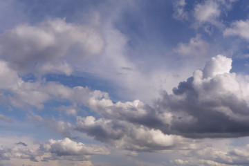background - blue sky with rain cumulus clouds