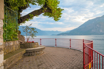 holidays in Italy - a view of the most  
beautiful lake in Italy, Varenna, Lago di Como. Pier in background