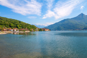 holidays in Italy - a view of the most  
beautiful lake in Italy, Varenna, Lago di Como. Famous city of Tremezzina in background