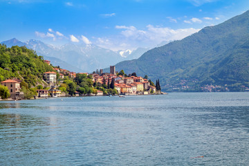 holidays in Italy - a view of the most  
beautiful lake in Italy, Varenna, Lago di Como. Famous city of Tremezzina in background