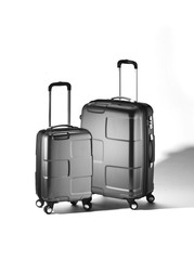 two black suitcases for traveling.