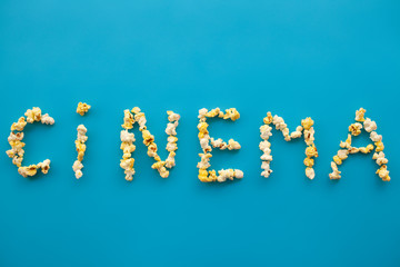 Food. Frozen Popcorn Corn Popcorn Bucket. Delicious Popcorn on Blue Background. Cinema.