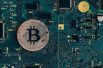 Printed circuit board with a chip and a bitcoin
