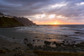 Fototapeta na wymiar Sun setting in Atlantic ocean. View from Playa de Benijo, Tenerife Island