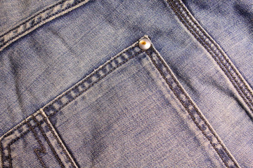 Blue shabby jeans. Denim. Close-up. Background. Texture.
