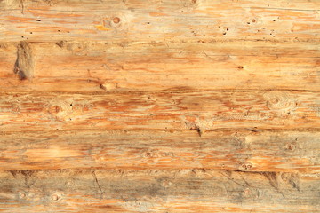 Obraz na płótnie Canvas New log and tow. The wall of the house. Background. Close-up. Vertical view. Texture.