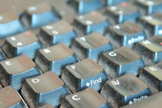 Dirty And Dusty Computer Keyboard In Black. Background. Texture. Close-up.