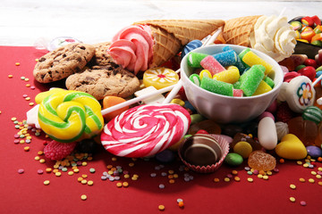 candies with jelly and sugar. colorful array of different childs sweets and treats