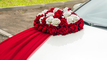 decoration on a wedding car made of flowers