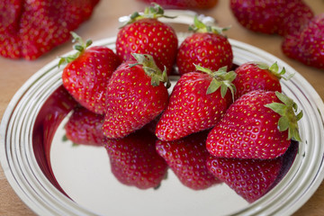 strawberries on silver plate