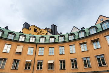 View at the orange walls of a building in old part of a Stockholm, Sweden.
