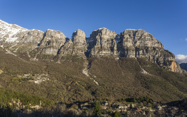 Natural towers of Astraka, mount Timfi and Papingo village in central Zagori