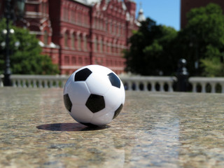 Fototapeta na wymiar Soccer ball on background of the Moscow Kremlin. Concept for football championship in Russia