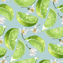 Seamless pattern in green and marine colors with lime slices and citrus lemon flowers