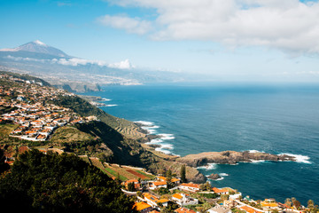 View of Atlantic coastline with El Teide Volcano from El Sauzal, Tenerife