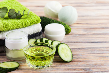Obraz na płótnie Canvas Natural cucumber cosmetics, organic lotion