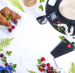 Woman trendy fashion clothes collage on white, flat lay, top view. Women's accessories. Planning a vacation. Berries and leaves. Flat lay. copy sapce