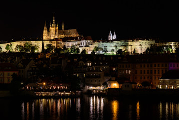 Obraz na płótnie Canvas Night view from, the Vltava river in the capital of the Czech Republic, Prague, Hradcany Prague castle