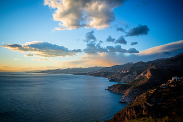 Fototapeta premium Granada, Spain; February 02, 2018: Sunset from the cliffs of Maro in Cerro Gordo