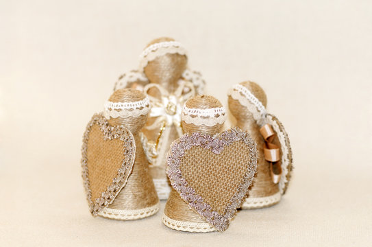 angel handmade souvenir, wrapped in rope and decorated with lace