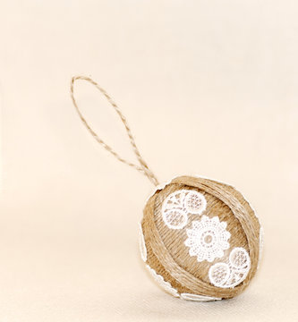Christmas toys, made with hands of thread and lace