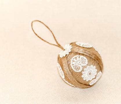Christmas toys, made with hands of thread and lace