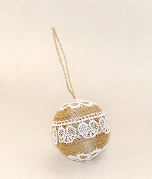 Christmas toys, made with hands of thread and lace