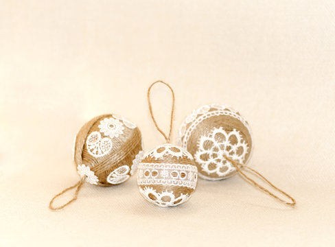 Christmas toys, made with hands of thread and lace