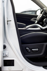 Obraz na płótnie Canvas Car interior blurred and focus on the plate under VIN car number