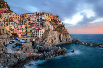 The colorful houses of Manarola during sunset in Cinque Terre, Liguria, Italy