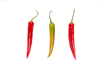 Red and green chilli peppers, hot cooking spices Isolated against a white background.